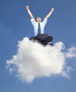 Man with laptop sitting on a cloud image